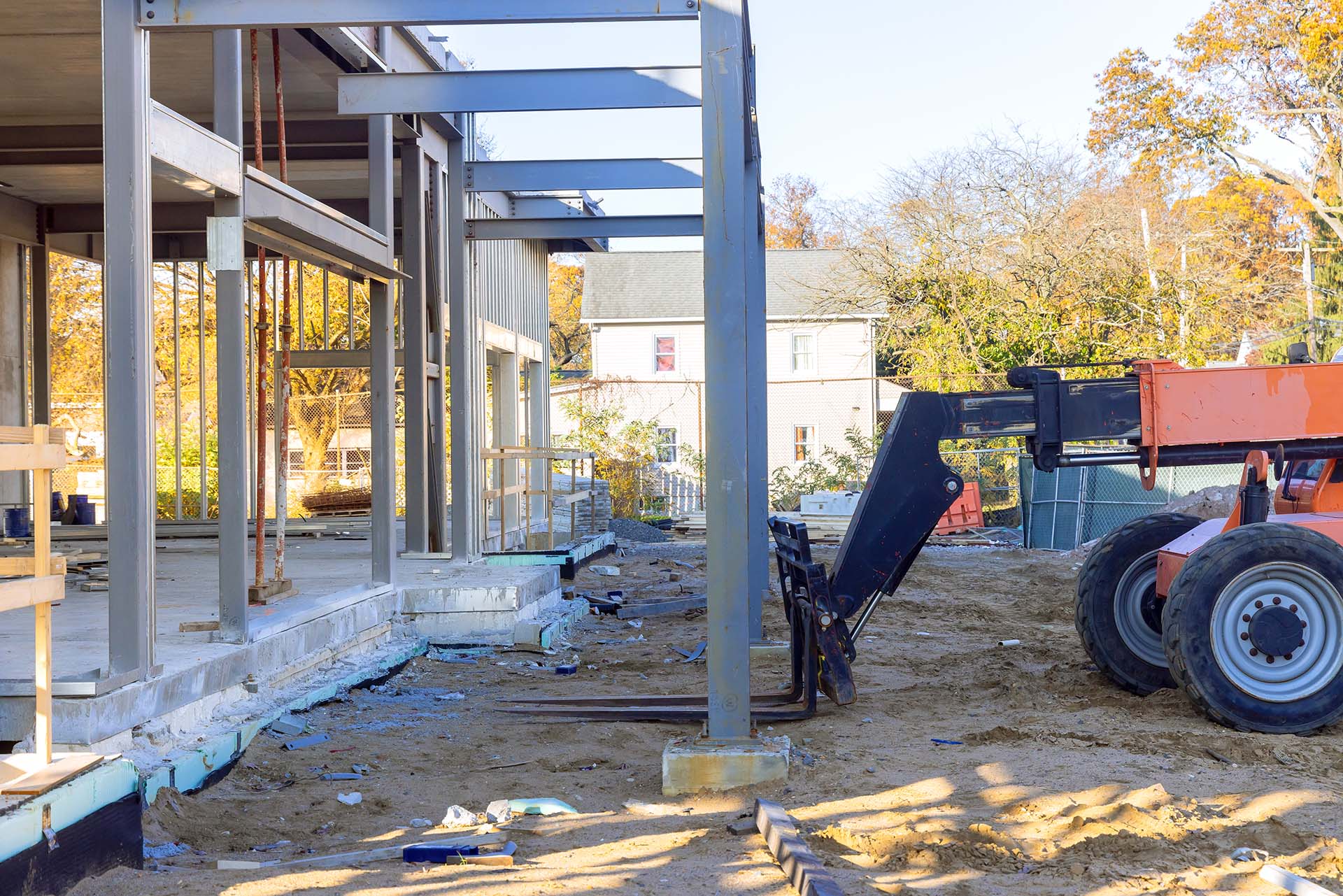 Steel framework frame beams are being erected for an industrial a commercial building
